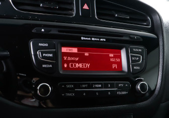 Подержанный автомобиль Kia Ceed Wagon 2013 года (15 фото)