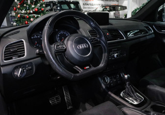 Подержанный автомобиль Audi Q3 2017 года (13 фото)