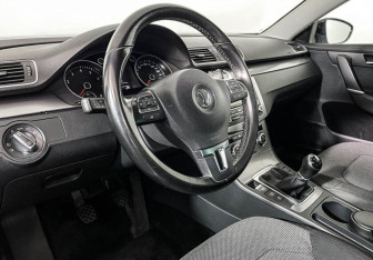 Подержанный автомобиль Volkswagen Passat Sedan 2014 года (13 фото)
