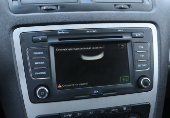 Подержанный автомобиль Skoda Octavia Liftback 2011 года (15 фото)