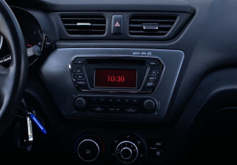 Подержанный автомобиль Kia Rio Sedan 2014 года (12 фото)