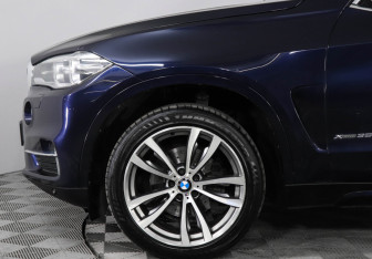 Подержанный автомобиль BMW X5 2014 года (8 фото)