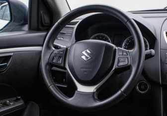 Подержанный автомобиль Suzuki Swift Hatchback 2011 года (15 фото)