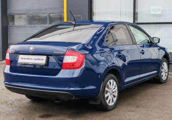Подержанный автомобиль Skoda Rapid Liftback 2014 года (5 фото)