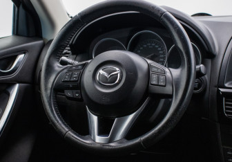 Подержанный автомобиль Mazda CX-5 2014 года (15 фото)