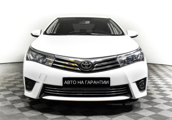Подержанный автомобиль Toyota Corolla Sedan 2014 года (2 фото)