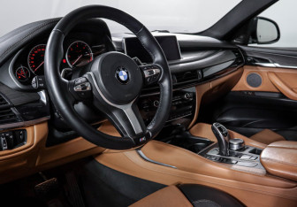 Подержанный автомобиль BMW X6 2017 года (14 фото)