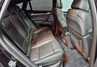 Подержанный автомобиль BMW X6 M 2013 года (11 фото)
