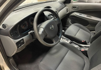 Подержанный автомобиль Nissan Almera Classic 2010 года (9 фото)