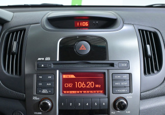 Подержанный автомобиль Kia Cerato Sedan 2010 года (14 фото)