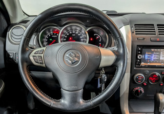Подержанный автомобиль Suzuki Grand Vitara 2014 года (21 фото)