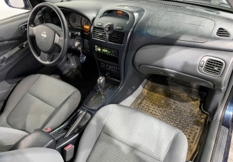 Подержанный автомобиль Nissan Almera Classic 2006 года (9 фото)