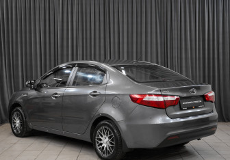Подержанный автомобиль Kia Rio Sedan 2012 года (7 фото)
