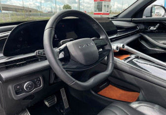 Подержанный автомобиль Exeed RX 2023 года (13 фото)
