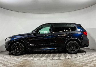Подержанный автомобиль BMW X5 2016 года (15 фото)
