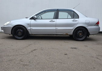 Подержанный автомобиль Mitsubishi Lancer Sedan 2009 года (8 фото)