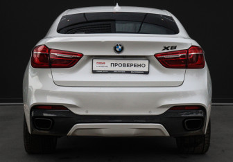 Подержанный автомобиль BMW X6 2016 года (6 фото)