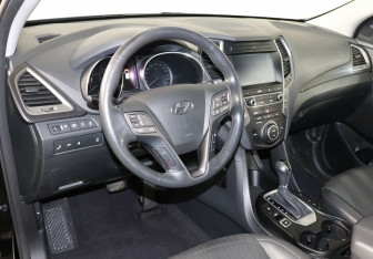Подержанный автомобиль Hyundai Santa Fe 2016 года (10 фото)
