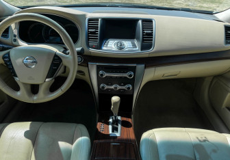 Подержанный автомобиль Nissan Teana 2013 года (12 фото)