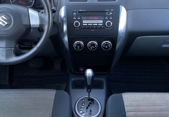 Подержанный автомобиль Suzuki SX4 Hatchback 2009 года (13 фото)