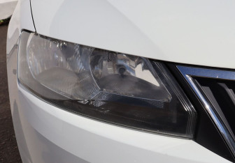 Подержанный автомобиль Skoda Rapid Liftback 2014 года (25 фото)