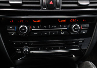 Подержанный автомобиль BMW X6 2016 года (14 фото)