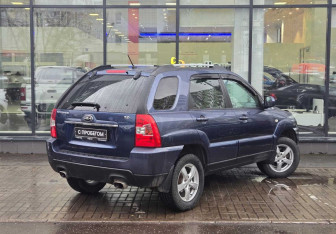 Подержанный автомобиль Kia Sportage 2010 года (8 фото)