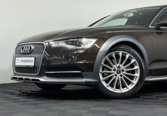 Подержанный автомобиль Audi A6 allroad 2014 года (19 фото)