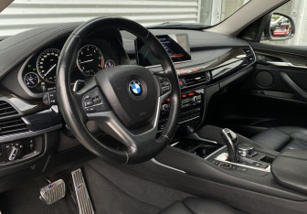 Подержанный автомобиль BMW X6 2016 года (16 фото)