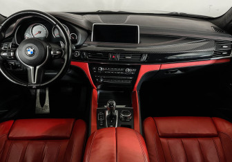 Подержанный автомобиль BMW X6 M 2015 года (11 фото)