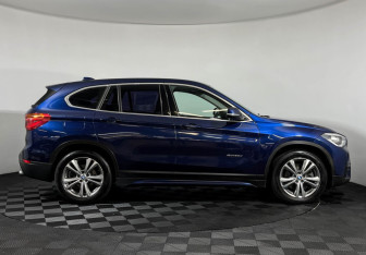 Подержанный автомобиль BMW X1 2015 года (6 фото)