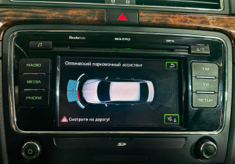 Подержанный автомобиль Skoda Superb Liftback 2011 года (21 фото)