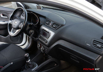 Подержанный автомобиль Kia Rio Hatchback 2014 года (9 фото)