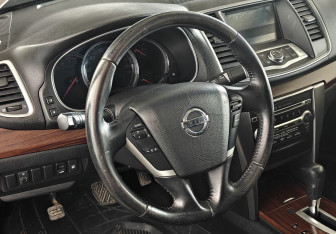 Подержанный автомобиль Nissan Teana 2011 года (13 фото)