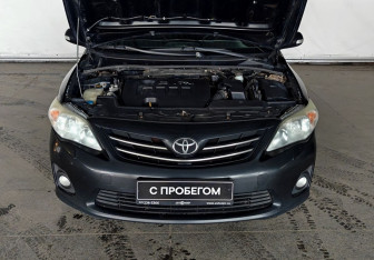 Подержанный автомобиль Toyota Corolla Sedan 2010 года (17 фото)
