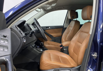Подержанный автомобиль Volkswagen Tiguan 2014 года (13 фото)