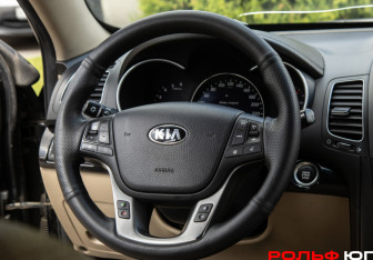 Подержанный автомобиль Kia Sorento 2012 года (11 фото)