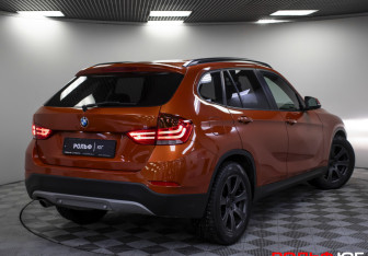 Подержанный автомобиль BMW X1 2014 года (19 фото)