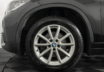 Подержанный автомобиль BMW X1 2018 года (7 фото)