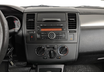 Подержанный автомобиль Nissan Tiida Sedan 2012 года (17 фото)