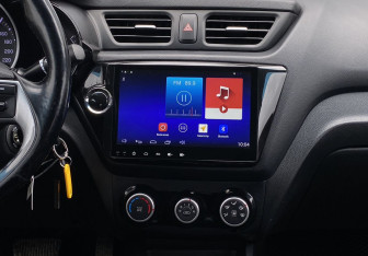 Подержанный автомобиль Kia Rio Sedan 2015 года (12 фото)