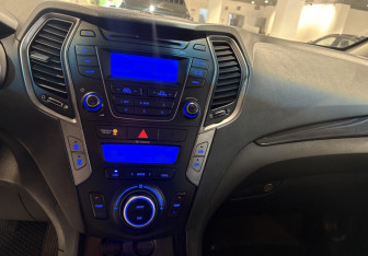 Подержанный автомобиль Hyundai Santa Fe 2014 года (10 фото)