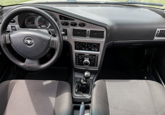 Подержанный автомобиль Daewoo Nexia Sedan 2013 года (12 фото)