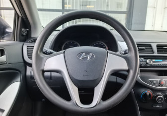 Подержанный автомобиль Hyundai Solaris Sedan 2012 года (13 фото)