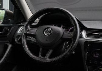 Подержанный автомобиль Skoda Rapid Liftback 2018 года (11 фото)