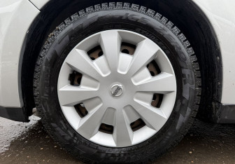 Подержанный автомобиль Nissan Tiida Hatchback 2006 года (9 фото)