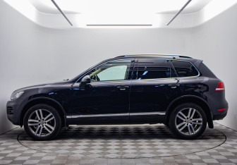 Подержанный автомобиль Volkswagen Touareg 2013 года (2 фото)