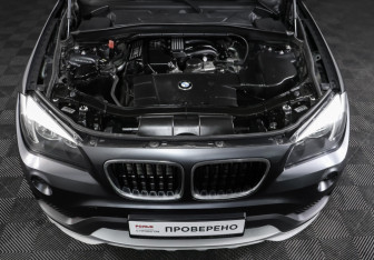 Подержанный автомобиль BMW X1 2014 года (9 фото)