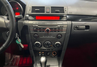 Подержанный автомобиль Mazda 3 Sedan 2007 года (14 фото)