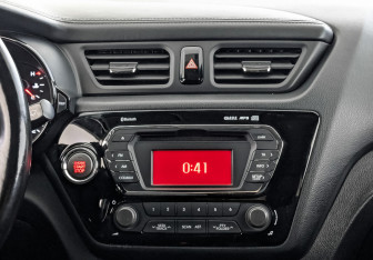 Подержанный автомобиль Kia Rio Sedan 2013 года (17 фото)